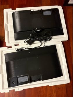 A pair of 24 inch Samsung monitors