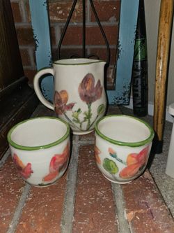 Small glass pitcher with 2 cup set