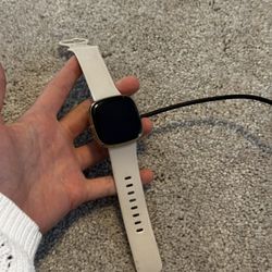 Fitbit Wearables Smartwatch in White & Gold  with Charger and Wrist Strap