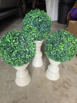 Candle holders and greenery