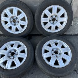 Audi A4 15 inch aluminum rims with old tires. 5 on 112mm