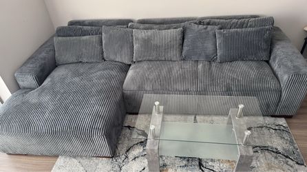 L-Shaped Sectional Sofa, Grey Corduroy 114" Category: Furniture › Sofas & Loveseats Condition: Like New Dimensions: 114.5" W x 67" D (chaise side) x 3