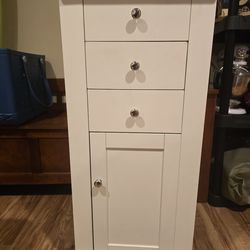 Rolling cart with drawers and hooks