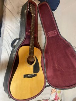 six string fender guitar with case