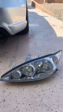 02-06 Toyota Camry driver left headlight halogen