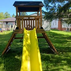 Wooden play set new last year. Trampoline play set