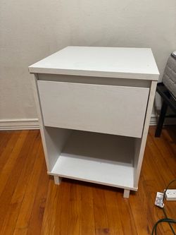 White wooden nightstand side table