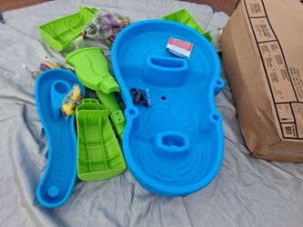Rain showers splash pond water table  is new