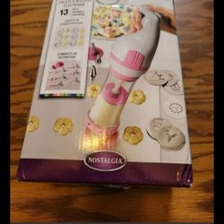 Nostalgia Electric 11 pieces Cookie Press pink and white