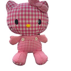 Hello Kitty by sanrio Plush toy plaid red Strawberry Size 12 Inches 2010  This adorable plush toy of Hello Kitty by Sanrio is a must-have for any fan