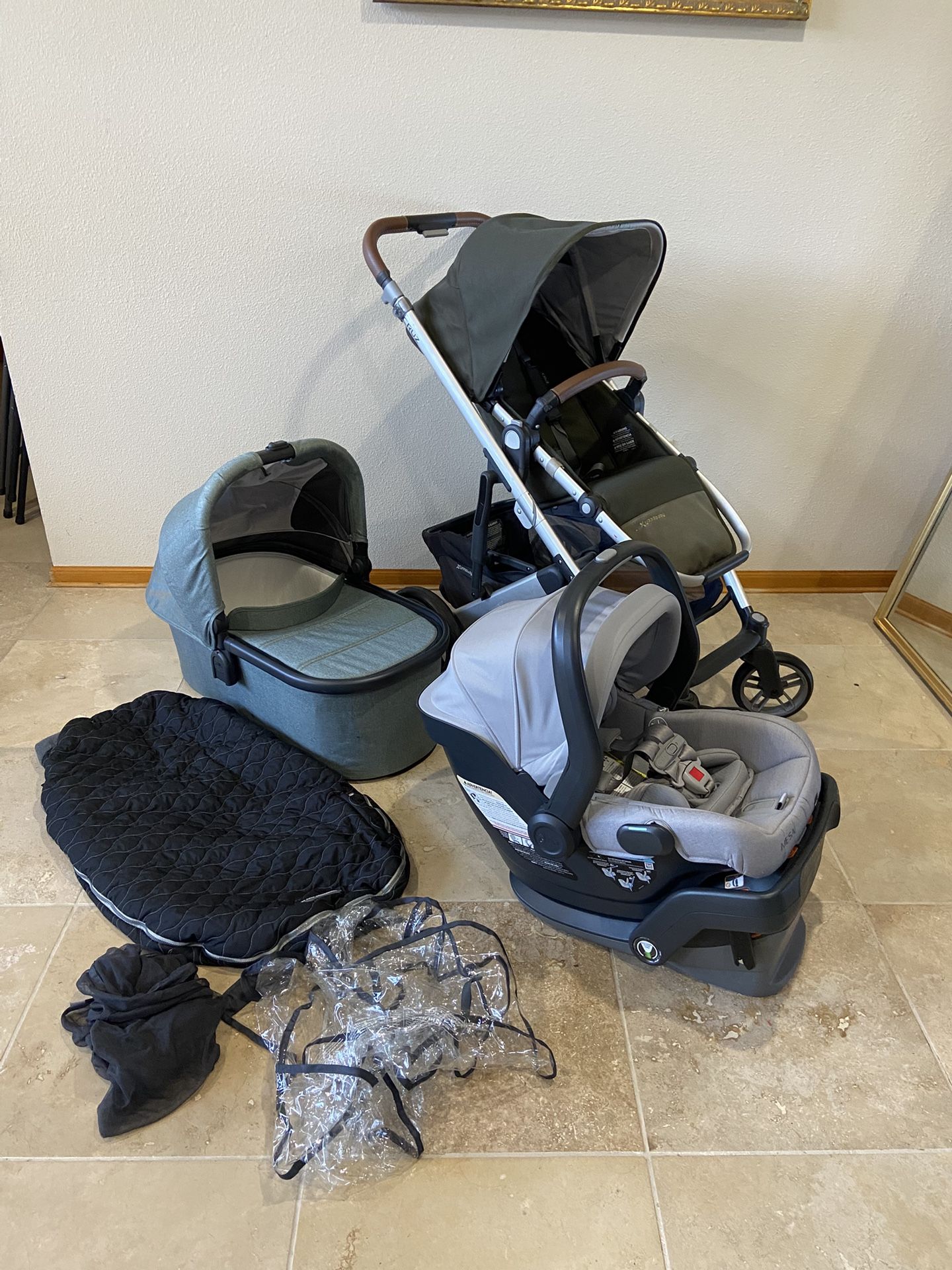 Uppababy Cruz V2 stroller with Bassinet and car seat and cozy ganoosh