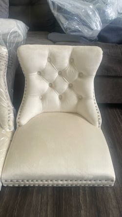 Beige high chairs new $60