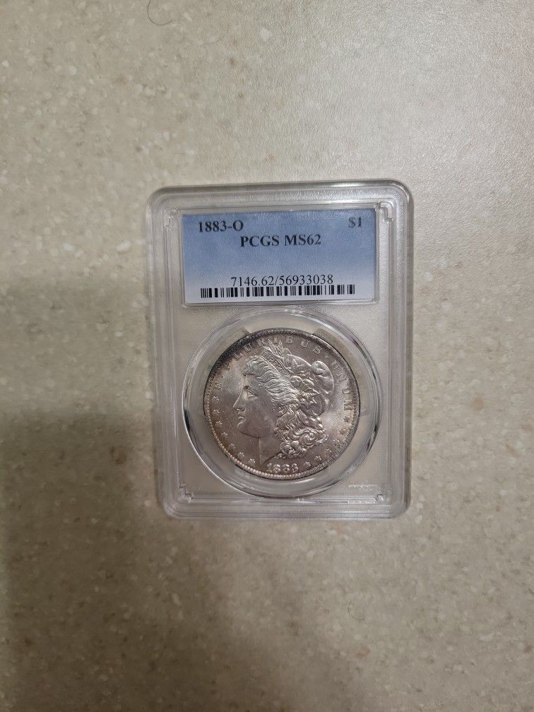 1883 O Morgan Silver Dollar. Graded