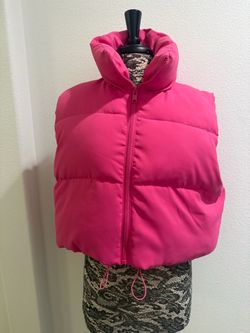 Pink puffer vest with