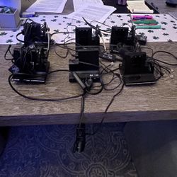 (6) plantronic W730 headsets (1 without an ear piece)