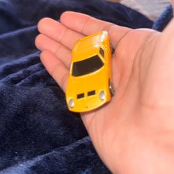 yellow Maisto 1966 Lamborghini Miura die-cast toy car