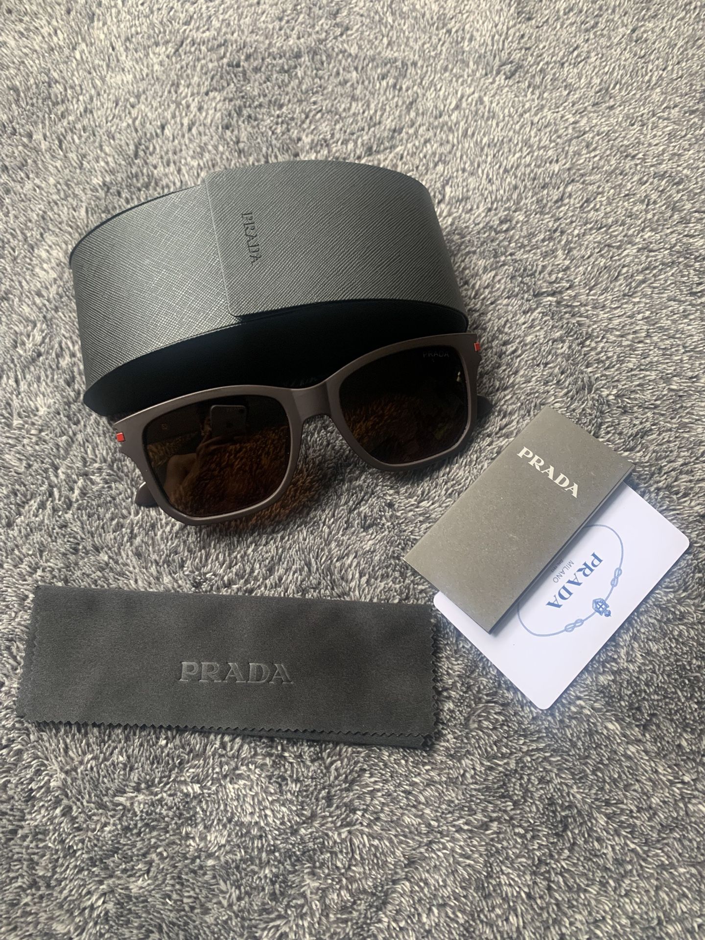PRADA SUNGLASSES