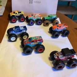 Hot Wheels RACE Monster toy trucks 7 total 1:64 scale Including Grave Digger, Bigfoot #68, Bigfoot 4x4, Bone Shaker, Trick Flow Firestone, Race Ace, A