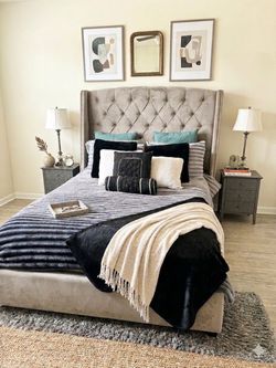 Grey queen size bed with storage and mattress