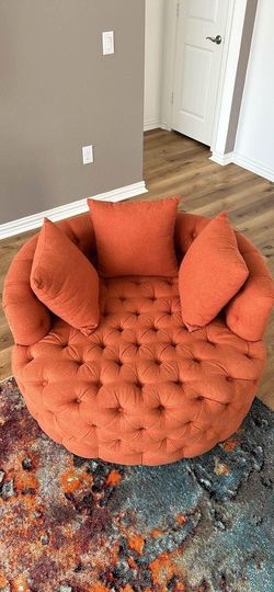 Orange Tufted Round Swivel Accent Chair