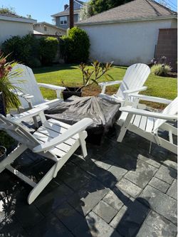 4 wood Adirondack foldable chairs