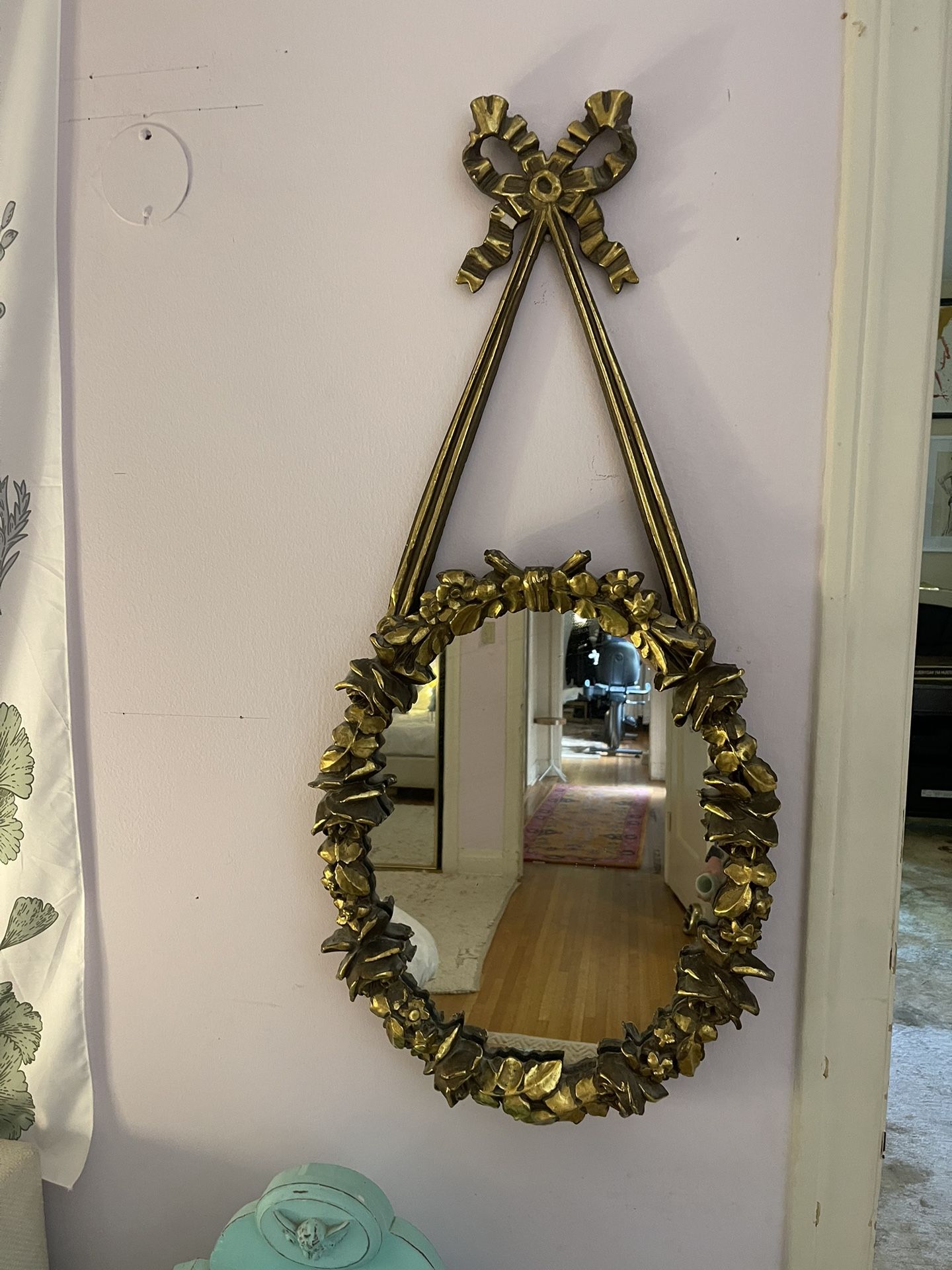 Hand-carved wood framed gilt mirror