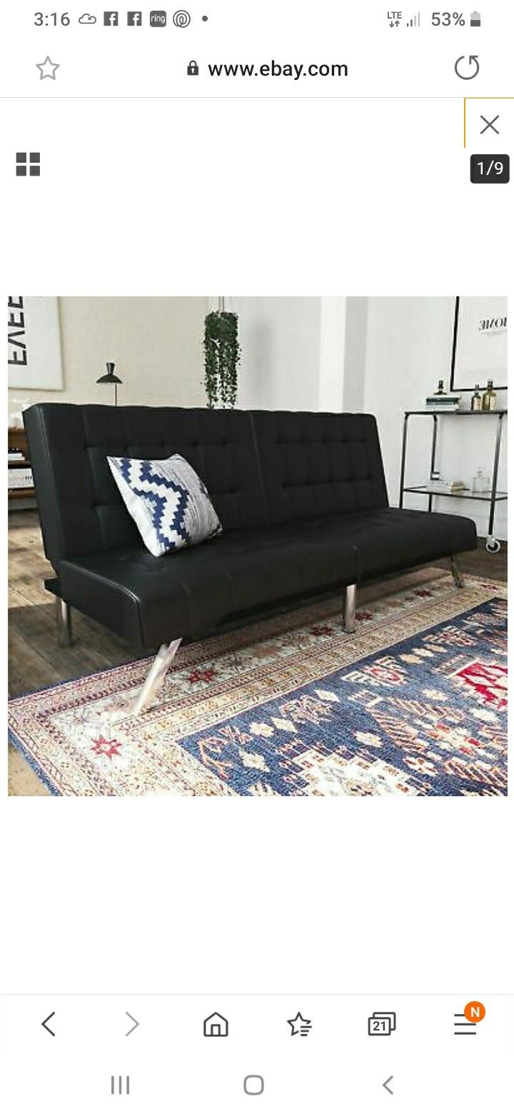 New in box faux leather futon sofa