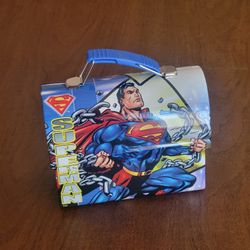 Superman Man of Steel Mini Lunch Box Tin Box DC Comics Blue Handle L 
5.5" x H 4.5 W 2.5. Weight 5oz plus shipping materials. Perfect shape, 
like new