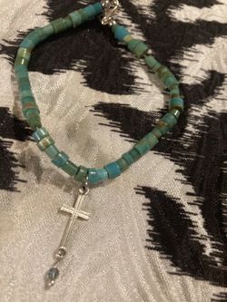Turquoise Bracelet with a cross turnfits 8 inch size wrist - plus size $15