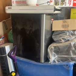 mini fridge / tiny freezer inside 