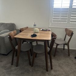 Four Chairs And  Dining Table