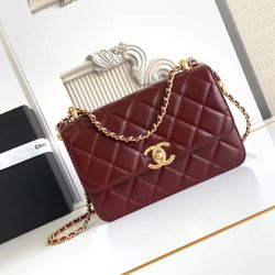 A fashion trend bag with a golden ball