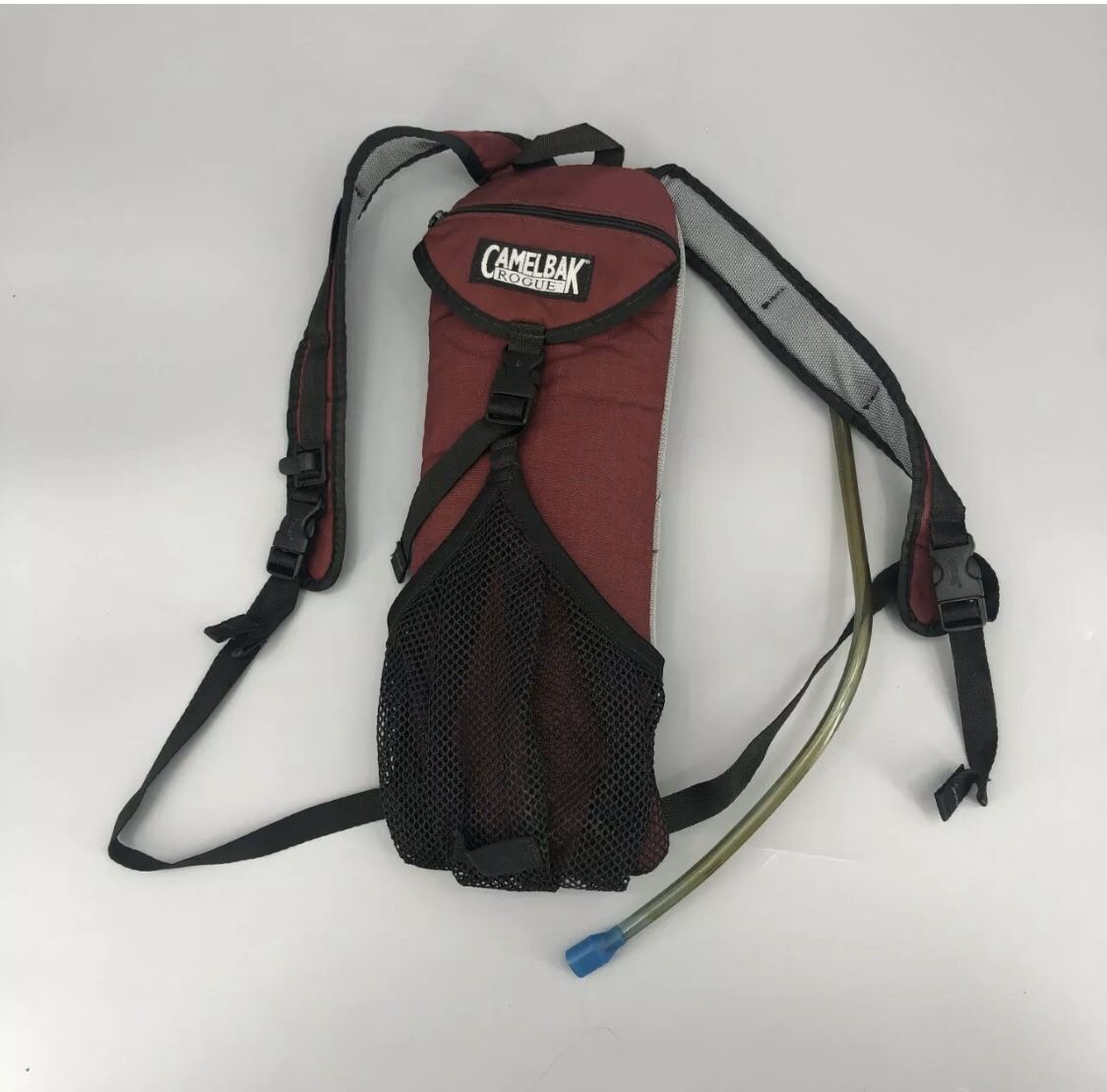 CamelBak Rogue Hydration Backpack With Bladder 2L/70 Oz. Burgundy Red Mesh Back