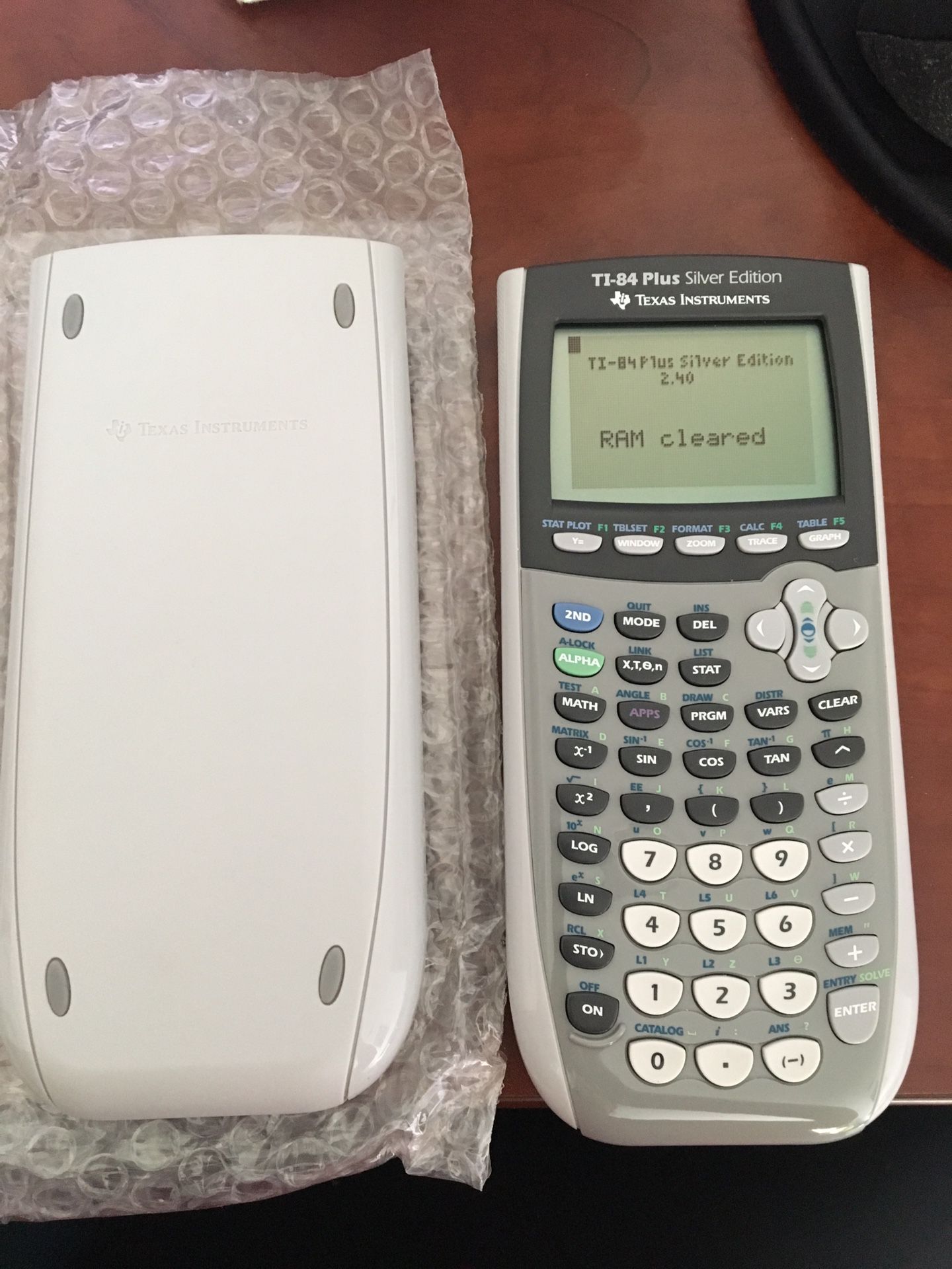 NEW Texas Instruments TI-84 Plus Silver Edition Graphing Calculator