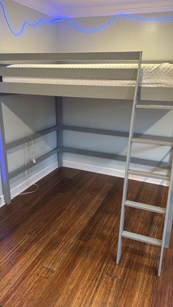 Full Size loft bed with Space below for computer desk. Come with mattress