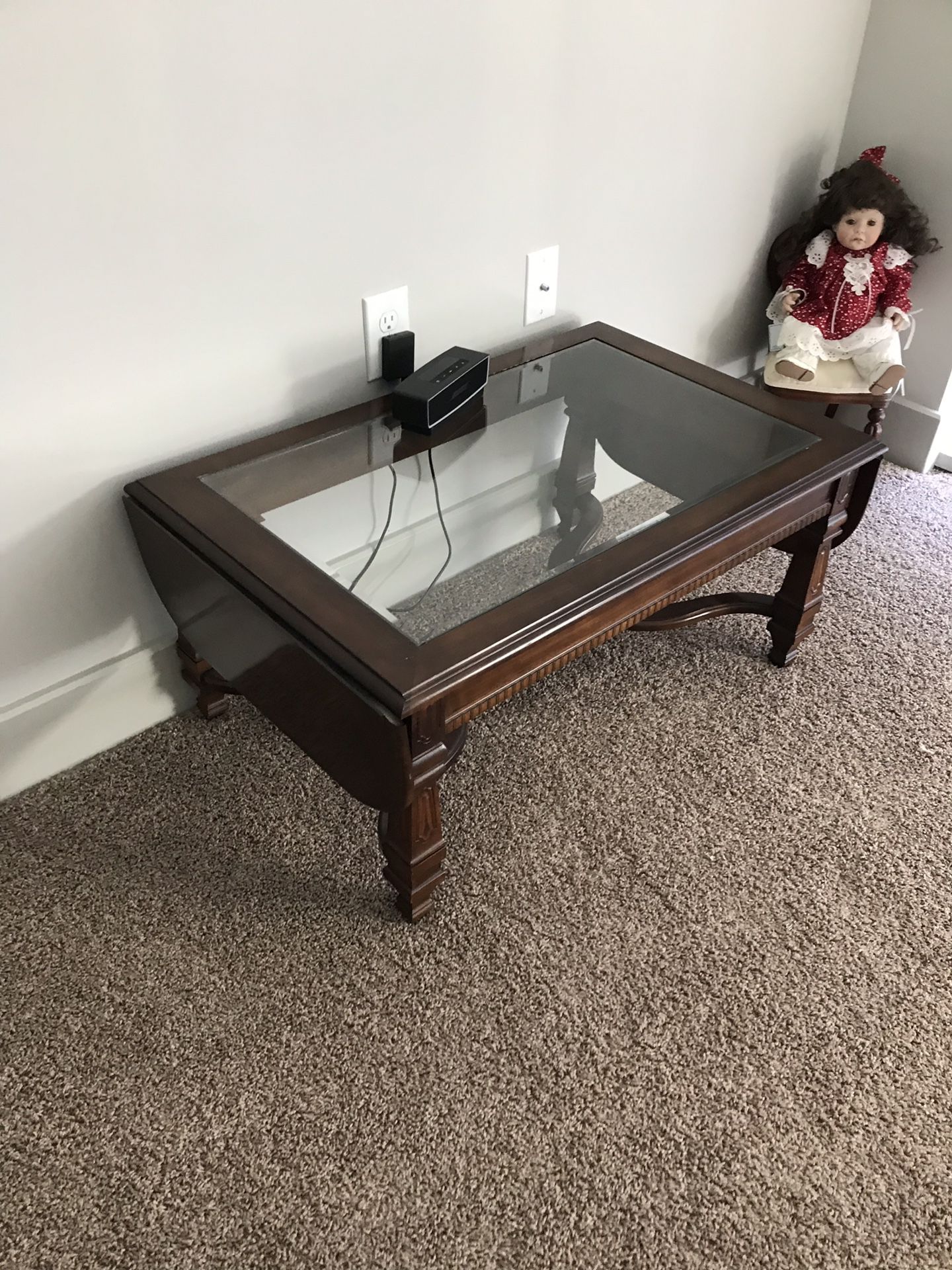 Antique coffee table with two folding leafs