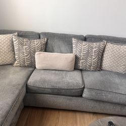 Grey Sofa/ Has A Pullout Sleeper 