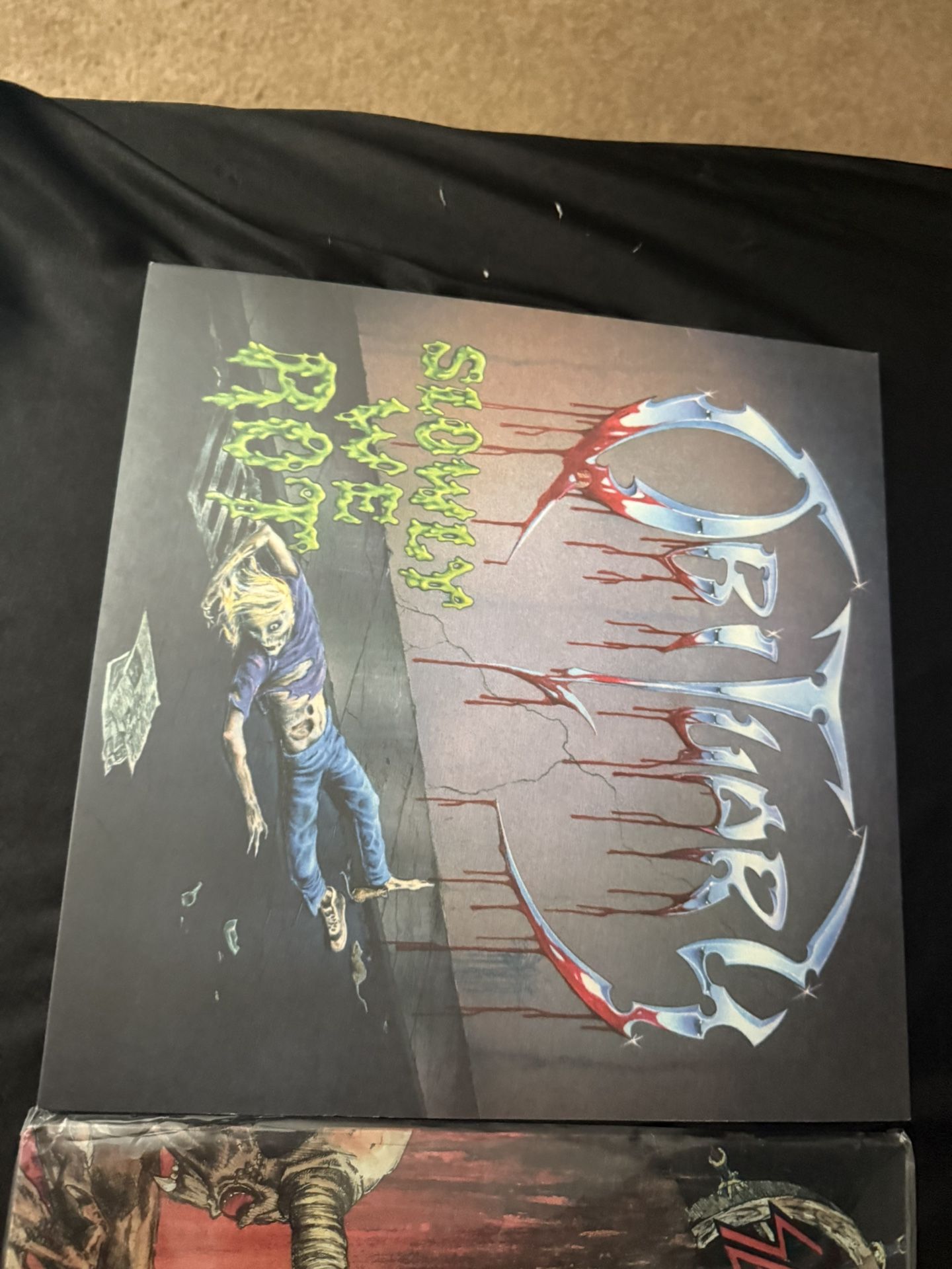 Obituary Vinyl “ Slowly We Rot”