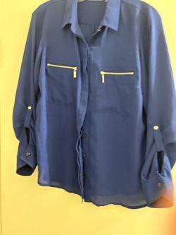 Blue long sleeved buttoned blouse