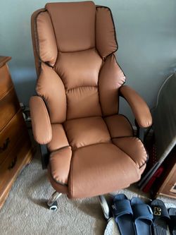 Light brown new recliner chair