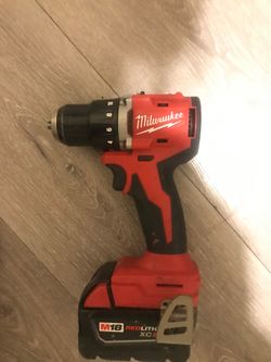 Milwaukee drill and battery and charger