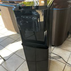 Water Dispenser Bottom Load Cooler…39” Height By 12” Wide By 13” Wide In Great Condition. (MISSING THE CUP STAND SEE 2ND PICTURE)… $125
