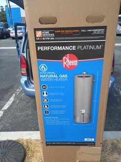 NEW IN BOX:  RHEEM  40 GAL NATURAL GAS WATER HEATER PERFORMANCE PLATINUM  12 YR. WARRANTY