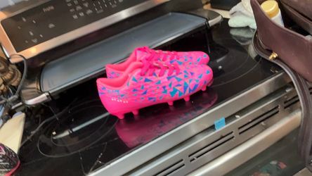 Pink Soccer Cleats with Blue Triangle Print