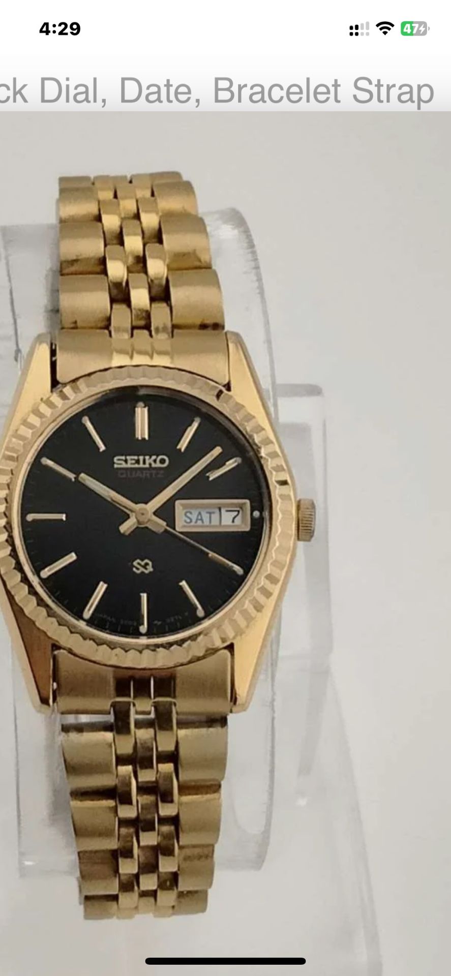 Seiko gold tone watch w/black face & day date bracelet band raised markers 6-1/2 “ long needs batter