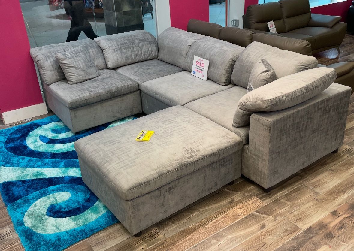 Going out of business sale. Lima gray sectional with ottoman now $899. Easy finance option. Same day delivery.