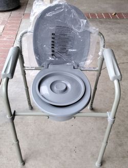 Portable Toilet, lid, leg height adjustable - New - $25 firm