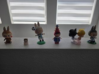Pop mart figurines collection. Labubu and Dimoo