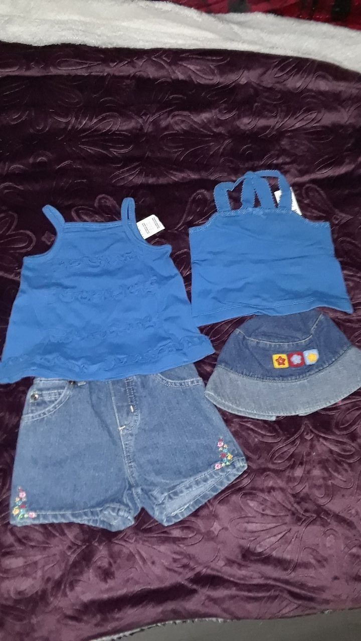 SHORTS 12 MONTHS, BLUE TOPS 6 TO 9 MONTHS EACH, HAT ONE SIZE, $12 FOR ALL