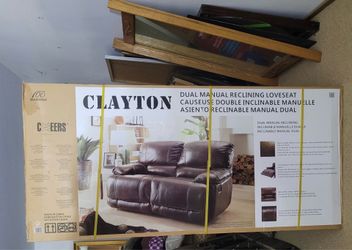 Clayton leather dual reclining loveseat